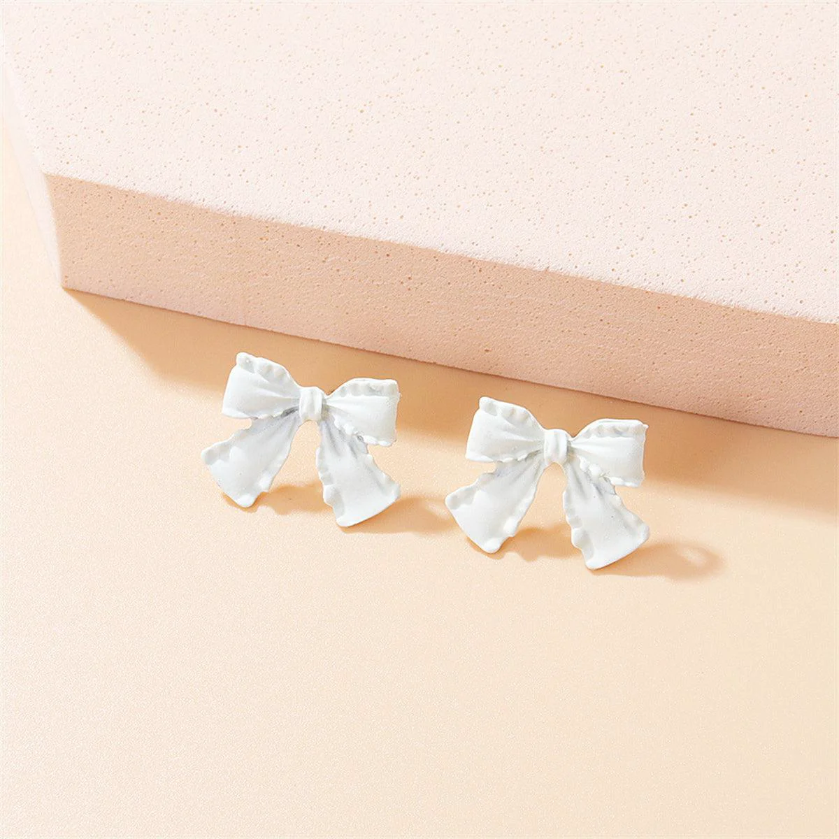 Authentic White Enamel Silvertone Bow Stud Earrings Premium