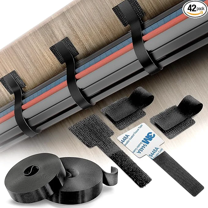 First-Class Cable Management Kit – 40 Self-Adhesive Hook and Loop Ties with 2 Extension Straps – Made with 3M Tape Back-Sticky Cord Organizer for Under Desk Wall Home Office – Adjustable Wire Holders Black About ThisOverview Relaxed