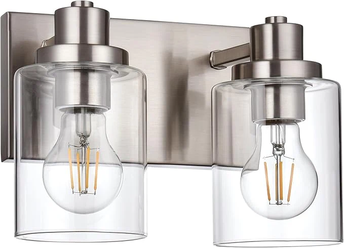 Versatile 2 Light Vanity Light Fixtures - Brushed Nickel Modern Design with Clear Glass Shade Farmhouse Style Over Mirror LightingAbout ThisOverview Practical