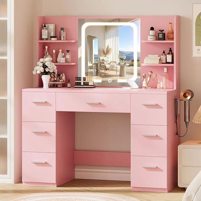 Comfortable Large Makeup Vanity Desk 43.3 W x 15.7 D x 53.2 H Pink Large Desktop Samrt LED Mirror 4 Open Shelves 7 Drawers Hairdryer Rack Power-Outlet No Cushion Stool Included About ThisOverview Durable