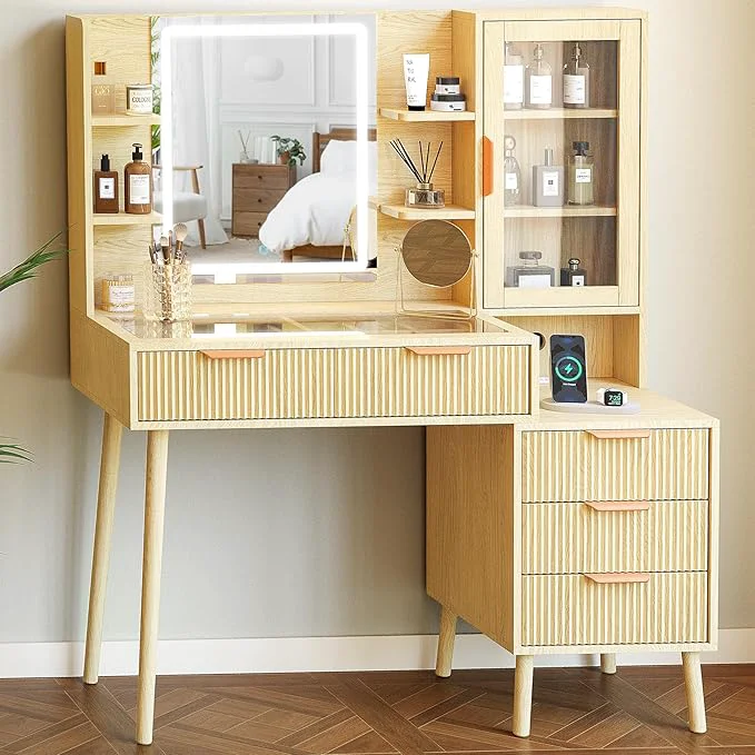 High-Quality Fluted Vanity Desk with Mirror and Lights 3 Color Clear Glass Door Dressing Table with Charging Station 5 Drawers Glass Top Makeup Vanity with 9-Grid Organizer and 10 Storage Light OakAbout ThisOverview Unique