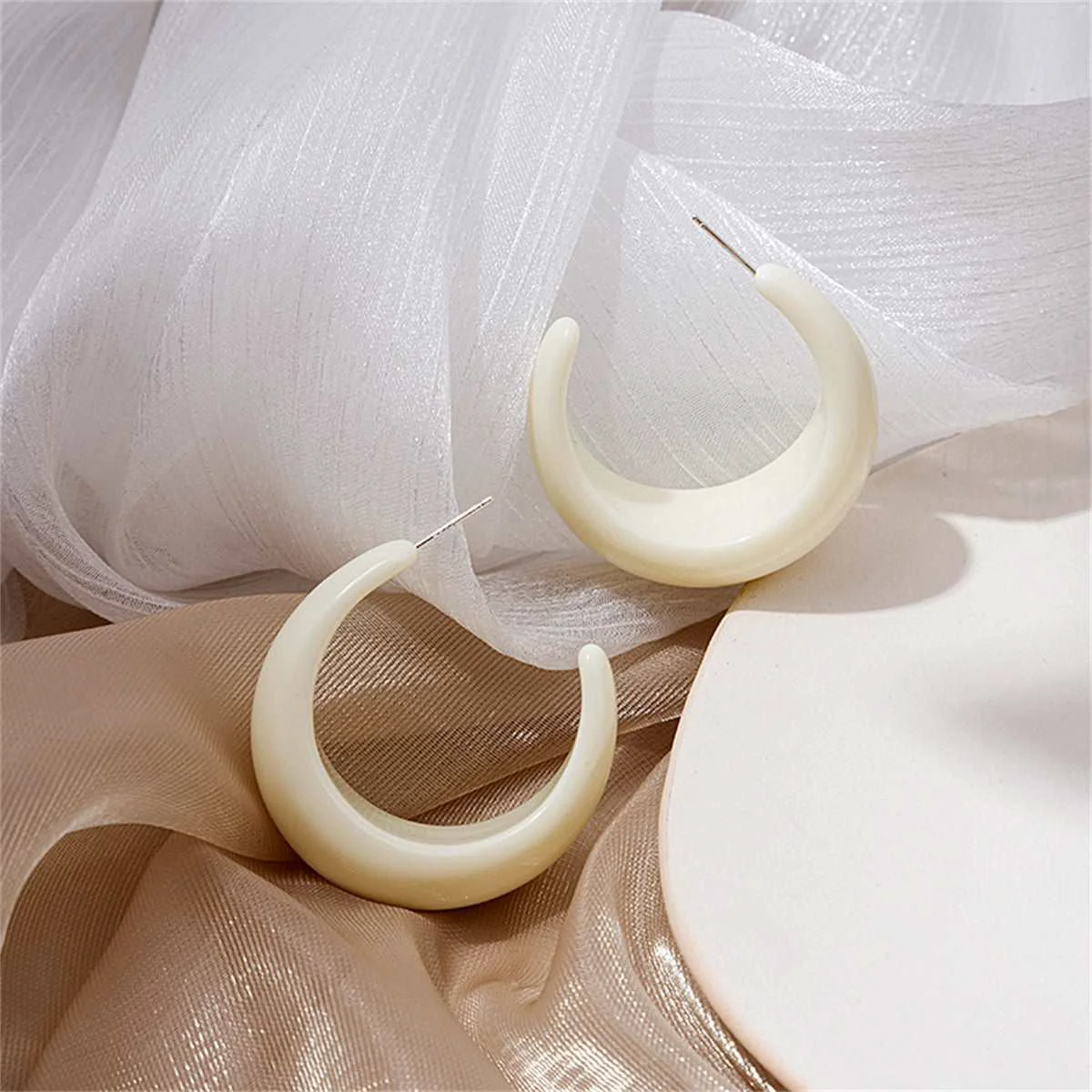 Certified White Resin Silvertone Crescent Huggie Earrings Premium