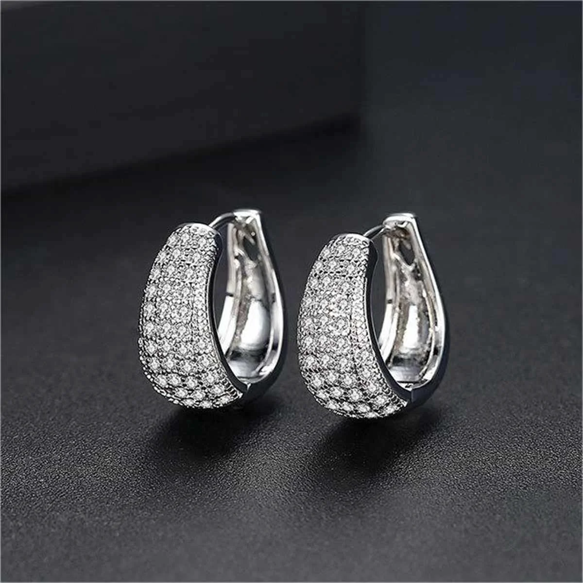 Advanced Cubic Zirconia Silvertone Pear Huggie Earrings Premium