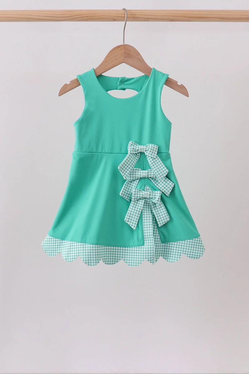 Official Green scalloped bow active dress Contemporary