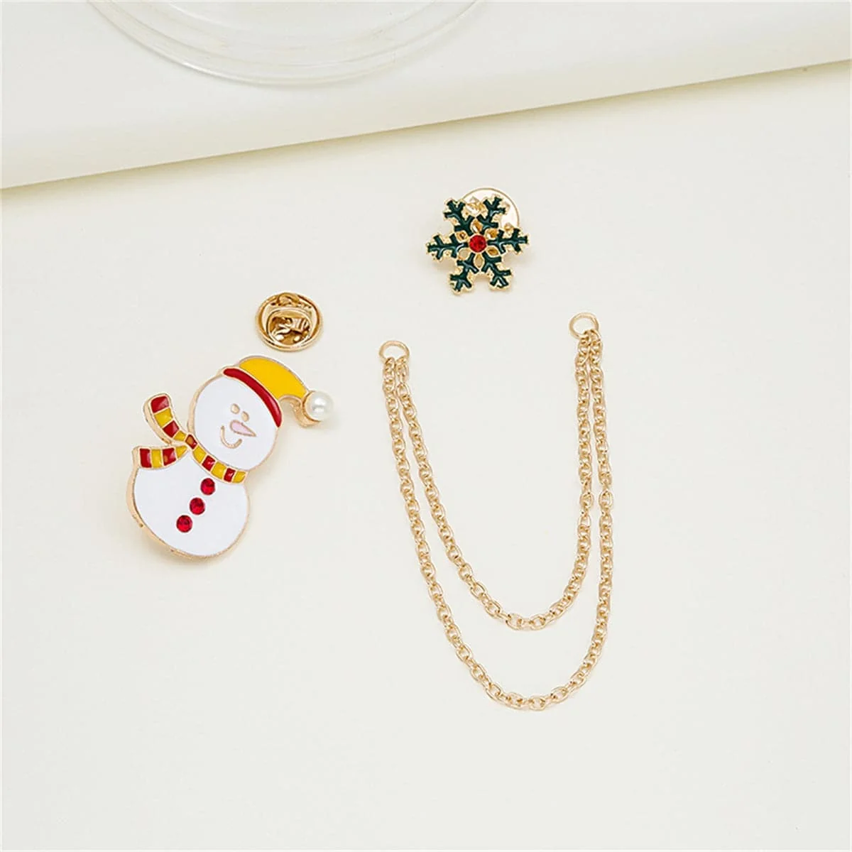 Consistent Cubic Zirconia Pearl Enamel Goldtone Snowman Snowflake Chain Brooch Soft