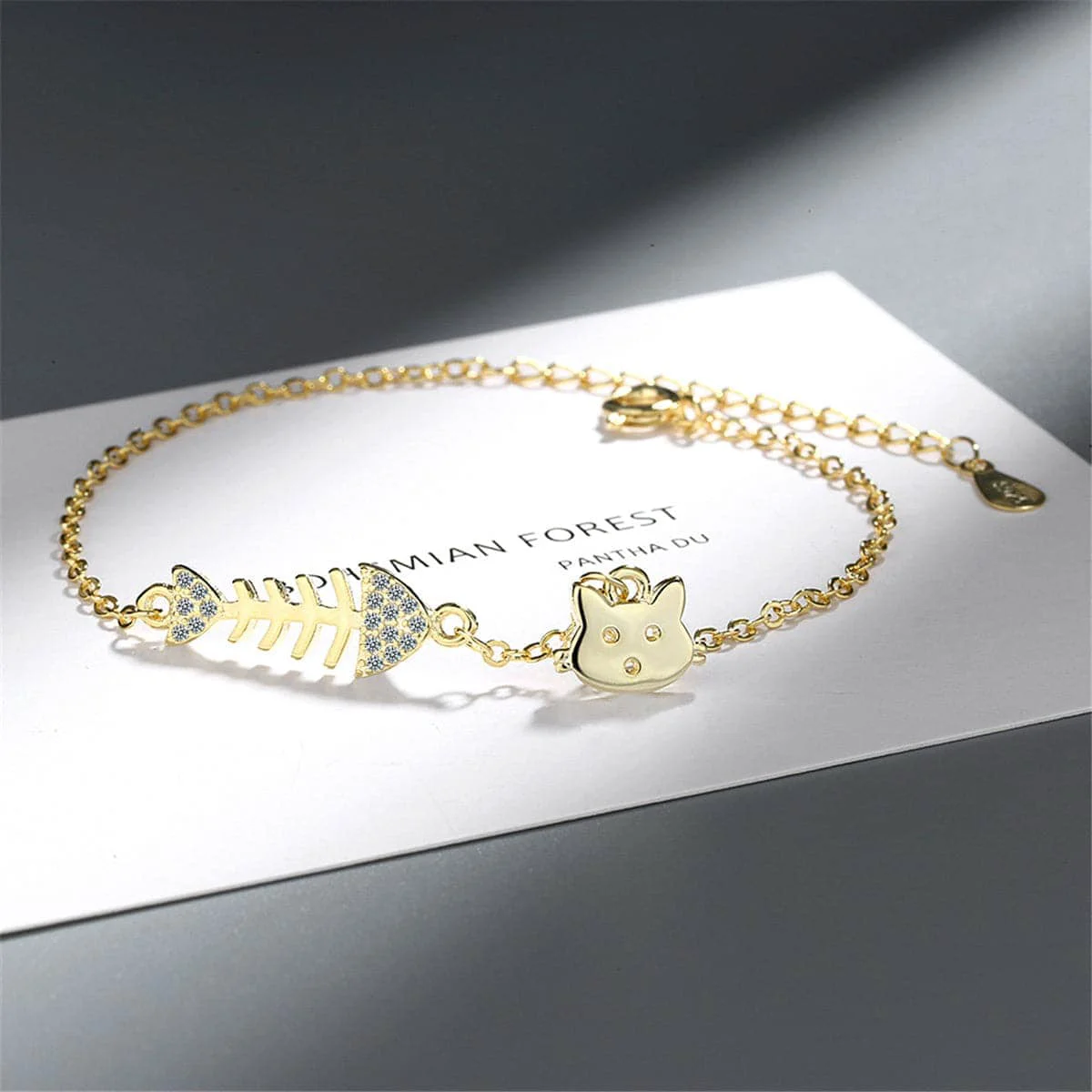 Traditional Cubic Zirconia Goldtone Fishbone Cat Charm Bracelet Effective