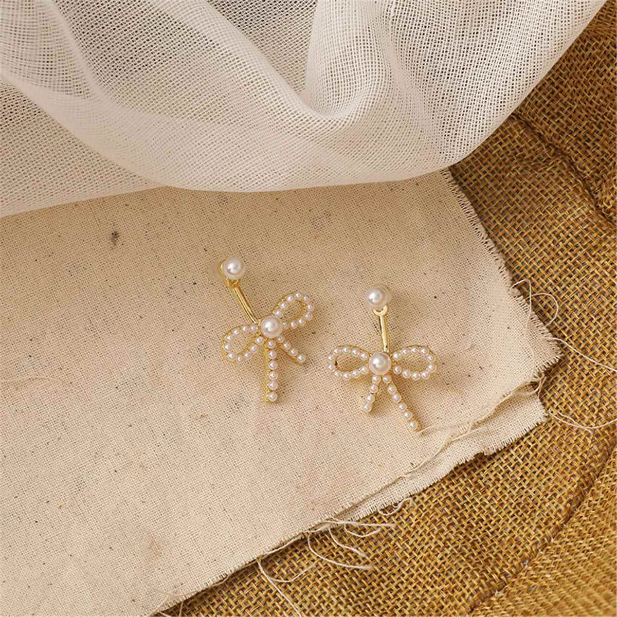 Powerful Pearl Goldtone Bow Ear Jackets Authentic